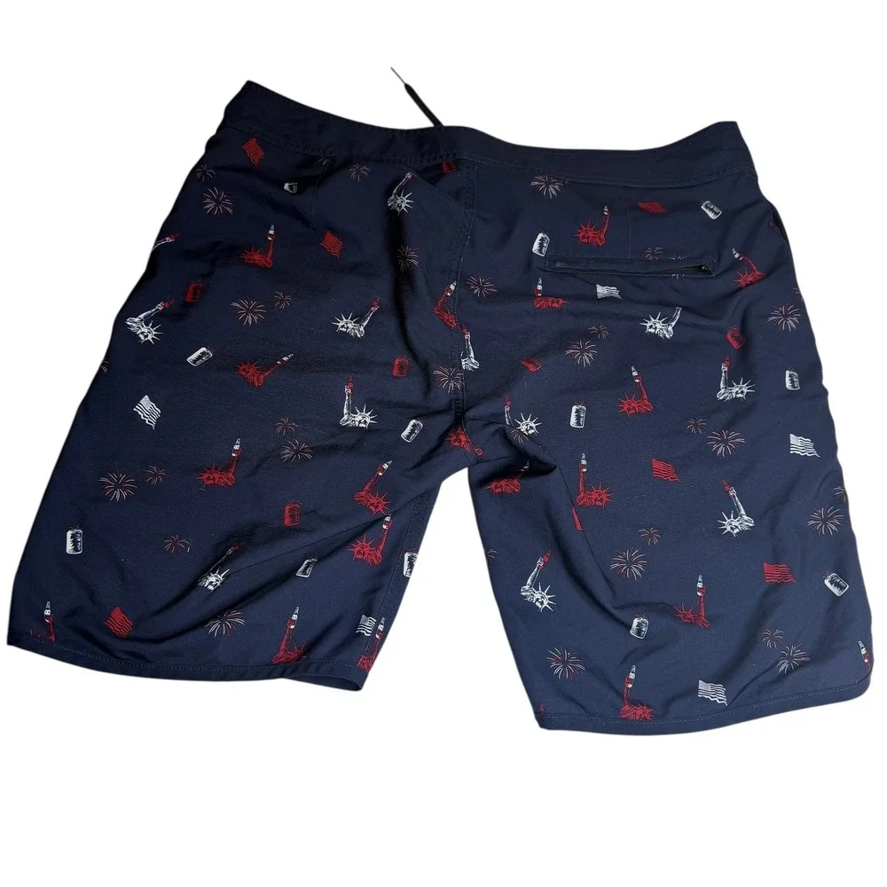 Travis Mathew Mens Swim Trunks Navy Blue Statue of Liberty Fireworks Print Sz 36